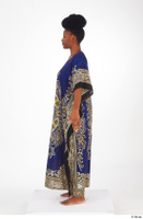  Dina Moses A poses dressed standing traditional long decora african dress whole body 0003.jpg
